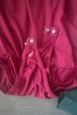 This item arrived with crusty, white discharge stains in the snap area.  I have no idea how it fits because I refuse to touch it.  Customer service is difficult to contact.  I receive an automated message each time that it is out of business hours when clearly, it is during business hours. - Heather K.