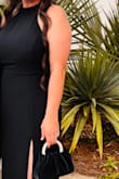 Black Halter Maxi Dress fits a little loose around the back & sides under bust area but overall is a comfortable & very pretty dress. I received a lot of compliments on the dress. It was perfect for cocktail, formal, wedding guest attire. Definitely recommend this beautiful dress! - Melody R.
