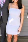 This dress was so comfortable when I wore it to my junior semi.

I'm a petite with hips and a bigger bust so it's always a miracle when I can find a dress that fits me perfectly! The length hits perfectly above the knee. I didn't even have to wear a bra! I'm a  32C but the bow tie in the back lets you tie it tight enough to your chest in. - Arianna S.