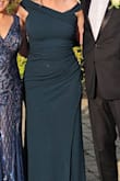 I was very happy with the quality and fit of the dress. It felt secure around the bust area and held up well on the dance floor. The colour was perfect and the rouching was flattering. The v-neck was off center compared to the photo on the website, but I didn't mind it! - Kailey M.