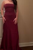 It's a gorgeous dress, but the color is more of a burgundy/wine color than the plum/pink color on the listing. - Rylie D.