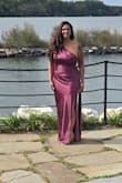 The dress was fitted and hugged every curve. I was originally concerned about how tight it'd feel on my chest, but it zipped perfectly, may require some assistance zipping. The lining inside is thick and soft, so it was perfect for a slightly chilly fall wedding. I got so many compliments on it! The color seems a little subdued than the picture online, but it was still beautiful. Recommend boob tape or nipple covers for large chests; the dress is tight enough to keep the girls in place. - Alessandra G.