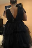 If you decide to go with this dress, be ready for compliments all night! The fit is beautiful and surprisingly comfortable. The neckline is definitely low-cut, so if you're fuller on top, I recommend finding a bra option that feels both secure and flattering. When I first tried it on, I used the "cakes" push-up pads, but they peeked out a bit, so I ended up ordering some push-up sticky bra pads from Amazon instead. They worked better, though I still added a small pin for extra coverage. Overall, this dress is gorgeous and made me feel confident and beautiful the entire evening. Perfect for a wedding guest look that's equal parts elegant and fun. - Cristina R.