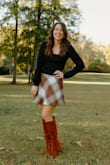 It is a little short (have to be careful bending down) but really nice fit and looked cute for photos! Paired it with another shirt I got from Lulus. - Tessa R.