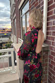 This dress worked perfectly for a wedding. I loved the open back and high slit. Received many compliments! I followed the suggested sizing recommendation (L) and it fit perfectly. The dress just needed a steaming to remove some wrinkles. Many people have talked about the buttons at the back of the neck falling off. Mine hung in there for the event, but one fell off when I got home. Overall, very minor issue to a fabulous dress. - Gail M.