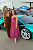 This dress is beautiful in person, very high quality, and fit so well. I ordered a medium and a large because I was worried about which part would be fitted, but it turned out great in the medium. - Sara A.