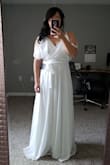 I loved the way the dress looked on the model. But it did not look right on me. 

The material was great! The dress was really  tight on me. I barely had it zipped on my to me bra line (I have a wide chest). It was cute, but didn't look flattering on me. - Joua M.