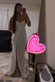 In love with my dress, we will be taking photos in June for our wedding, and this dress is perfect, it fits amazingly, and came really fast, and the packaging was neat. - Maria G.