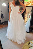 I bought this dress for my last minute elopement, and it is so cute. Great fabric, well made and really pretty. The shipping was really fast, too. I'm 5'4, 115lb, and flat chested- the extra small was way too small- not the dress's fault, but a size up would have fit me much better. I ended up returning it, but if it had fit- it was a contender. - Daphne B.
