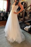 I bought this dress for my last minute elopement, and it is so cute. Great fabric, well made and really pretty. The shipping was really fast, too. Im 5'4, 115lb, and flat chested- the extra small was way too small in the rib cage area and way too loose in the lower back. I ended up returning it, but if it had fit, it was a contender. - Daphne B.
