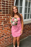 I ordered size small for my daughter. She's 5'4, about 140lbs, 34B. I measured her waist and hips at 29" and 40". She has an athletic body and a booty. The small fit her perfectly. We didn't have to make any adjustments. The tie-back allows for flexibility in the upper body, which helped make this fit nicely. She didn't have to worry about wearing a bra. The dress looks just like the photos. Has beautiful detail, thick material, well made. It was easy to steam out the wrinkles. The second picture (back view) is straight out of the bag. - Cory P.