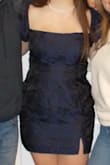 I really love the dress and how it looked. I thought it was a nice length, especially being 5'8. I have had a hard time finding dresses that were long enough in the past. I always order a size up from lulus, so I got an XL. It fit pretty good, the bottom part was a little bit tight, but not inconvenient or obnoxiously tight. The fabric has no stretch, which I had anticipated. I would totally recommend this dress, just make sure you go up a size! - Kendra M.