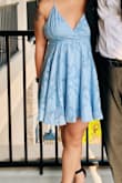 I love the baby blue color of this dress. It worked well for a springtime wedding. I will say it was a little loose in the bust, so I pinned it together to keep from flashing anyone on accident. It's lightweight and has two layers to give it a little volume. - Josephine C.