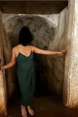 This dress was absolutely perfect for my friend's wedding! It was lightweight and fit perfectly. Beautiful color. The slit can be a little high when you sit down, so a nice shawl to cover your lap might be preferred. Other than that, it was exactly what I wanted, and I danced in it all night! - Katherine S.