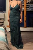 I loved this dress it. It was beautiful, form fitting, unique, and sexy. It was long for me, so I would have needed it hemmed. Ended up going with something shorter in the interest of time. BUT if it works for your occasion, don't stop, run for this dress! - Katherine S.