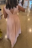 I love this dress. I wore it as a guest to a wedding and got so many compliments. The dress does run big. I don't recommend sizing up because the fit of the dress in the torso area, where it zips up, is true to size, but the length of the dress is very long, even with heels. I ended up getting mine hemmed, and it fit perfectly. - Chanel B.