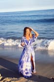 When I ordered this dress I thought I could rock it as a "casual" maxi dress on vacation or out for dinner, but it is a SHOW STOPPER! I've worn this at a beach resort, for date night, and on the Amalfi Coast of Italy and each time I received multiple compliments from strangers. The blue color is vibrant and gorgeous and while I usually opt for neutrals, there was something calming about the blue and the almost tie-dye print. The neckline is super flattering and the slit makes this dress feel a lot less caftan-y. Love this one, LuLu's! - Amy M.