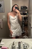 I bought a ton of dresses for my bachelorette, and this one did not make the cut. Unfortunately, as someone who is 5'9" and legit ALL legs, this was just the TINIEST bit too short for my liking. It also just.... didn't fit the vibe for my bachelorette. I ordered both a M and L of all my dress options, and this one, the medium, fit me better than the large, but it made a significant difference in height. The M was SO much shorter than the L... I am 5'9", 158 pounds, and I have an athletic/normal body type! - Samantha H.