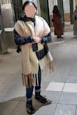This thing is huuuge!! I didn't realize from the image. It's almost my body length when on my neck. It looks so goofy on me. It did shield me from rain, however!! I used it like a blanket on the plane. - Gabrielle M.
