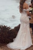 Loved this dress. It's an elegant dress, but what I loved about it- it was lightweight. We were taking photos on cliffs, mountains, and beaches, and I was able to drag the dress around with no problem. - Veronica H.