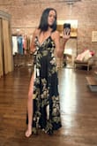 I purchased four dresses for a wedding. This is the one I kept. Its a little tricky for small chested ladies. I had to take it to a seamstress to take it in a bit, make the slit higher, and sew in padded cups for some support. I am 5'9", so the dress needed no hemming for me. 
I am 43 and thought this dress may be a little too "young" for me because it's a low cut style. It worked for me perfectly though. 
If you aren't comfortable with a low cut dress, this dress might not be for you. I initially had it sewn higher, so the dress had less cleavage, but then it didn't hang right. With a little tailoring, this dress was a 10 out of 10. - Kathryn S.