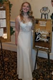 I bought this dress as my reception dress. The ceremony dress that I had picked was very puffy, so this was a perfect dress to be able to move and dance around in. I love the embroidered details on top and the slits on the side. I got many compliments on the dress throughout the night. I am on the shorter side, so I did have to get the dress hemmed and the straps taken in a little bit, but overall, a stunning, beautiful dress, and also for a great price. - JAMIE K.