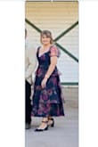This dress was so pretty and I got many compliments. I couldn't find a bra that wouldn't show, so I taped. Also, the sleeve kept slipping off of my shoulder. Overall, I liked it though. - Holly P.