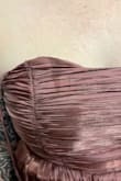 Took me hours of looking at reviews thinking this was the one even though it said it ran small but it was so small even after doing the size chart. When I finally got it on, it came with a big stain on the chest. Returning immediately. - Katelyn C.