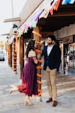 I wore this dress for my engagement pictures, and it was perfect! Super flattering, and it came out great in most of the pictures. The sleeves are a little tight around the arms, but if we were taking a picture with my arms raised, I just put the sleeves over my shoulders instead, and it looked/felt better. Definitely recommend this dress!! - Camille R.