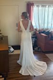 I wore this for my elopement/celebration, and it was everything I dreamed of. I got the bust closed up a little bit and added a bustle, but other than that, she fit perfectly! I did read it ran a little large, so I sized down to an XS and it was absolutely perfect. So many compliments, and I felt so beautiful. - Leah T.