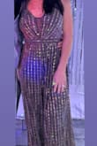 This jumpsuit is stunning. I am typically either a S or XS. I got the small and exchanged for an XS. It's a bit long as most things are on me, but it's worth it to either get a higher heel or hemmed. So pretty, unique, and also comfortable. - Lauren B.