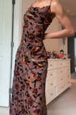 This dress was perfect for a wedding, but they only had medium left, so I didn't order. They said they'd restock in September, then that turned into October 23rd (the day I left the state), then no date provided, to having some back in stock less than a week before the wedding so I ordered & had it shipped asap! Straps held up, was a little loose in the middle, but nothing that made me feel fat or anything, and I loved how the velvet looked in different lighting :) very pretty and worth the timing anxiety - Alexis S.