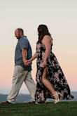 I wore this dress for my engagement photo shoot and it was perfect! We got some amazing sunset photos with the dress flowing in the wind! I got so many compliments on it and even wore it again on our Maui Honeymoon. 

As for the fit, I got an XL because I am a busty girl and wanted to make sure the chest area was big enough. I did end up having to get the top of it slightly altered just to give me some more space to be more comfortable, but the rest of the dress fit loosely. I'm just waiting to have another reason to wear it! - Courtney S.