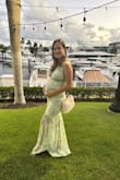 I ABSOLUTELY LOVED this dress a lot more than I thought I would. I was 28 weeks pregnant when I wore so due the stretchy nature of the fabric, I was able to go up 2 sizes and it fit like a glove! You definitely will need to wear some heels if you're on the shorter side. I'm 5'4 and definitely needed the height so the dress wouldn't drag. If you have enough time, you could always get hemmed. This is one of those dresses that just work when you're like me and leave an event outfit for last minute!!! Lulus shipping was fast and reliable. Price and quality are always the most reasonable.
I was panicking, not being able to find a dress that fit while pregnant that could make me feel both beautiful and didn't cost me a fortune. I got so many compliments on this dress. What I love most is that this dress will be a piece I keep wearing even postpartum because it just molds to your body. I think this dress would look lovely on many different body types. You will feel like a mermaid! - Andrea S.