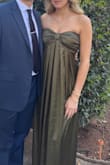 The dress itself was so stunning! The color was perfect and steaming the dress didn't ruin the pleating pattern or anything! The dress was a bit long for me, but nothing too obnoxious. I wore taller heels to offset that but overall perfect dress for a fall wedding guest! - Bayleigh M.