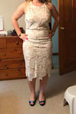 Well made cute dress. Returned it bc decided on going with a longer dress. - Megan G.