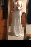 Very pretty and flattering to my shape. Wish it came in another color besides just white! Would love in ivory, champagne or pink! - Megan G.