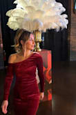 Absolutely love this dress. Everything about it was perfect. I did have the slit taken down because it was a bit too high for my taste. The original length made the dress feel less classy, but after bringing it down, it feels secure and looks even more elegant. The fit was like a glove, and the velvet red was a total show-stopper. - Kim E.