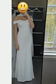 It is a beautiful dress, but it is very tight on your shoulders. For the pictures section, it can be tricky, but it is lovely!! Very soft material and good quality. - Bruna F.