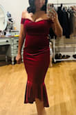 I really love the dress. I got a lot of compliments, but it was very tight! I'm not sure if a Large will be better since I ordered another dress from this brand in that size, and it was very big on me. The color is beautiful. One thing I really don't like is that the hanger loops are annoying; they keep showing out all night. - Caroline D.