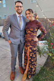 Absolutely beautiful dress. I'm between sizes, so I went up and ordered a medium based on reviews. Zipper is pretty long but not too noticeable. Got lots of compliments on it! - Kelsey K.