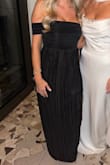 I ordered this dress to wear to a fall wedding. It was very comfortable, and I received many compliments on this dress. The fabric is very soft and flowy. There is a slit, it just isn't on my good side lol - Sara L.