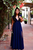 I got this dress when I attended a wedding during the fall season so i opted for a darker hue of blue (They have a wide variety of colors to choose from!) The dress is a very good quality, with good lining. It is not padded but the material is thick so you won't even need it. If you're short like me you might want to alter the length of the dress to fit your size but overall I am very happy with this dress. The slit on the side gives it a hint of sass. - IDA N.