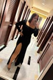 This dress was beautiful and fit perfectly with a stretch to it.  The slit was a little higher than I expected, but ended up just fine.  Would highly recommend. - Kendra H.