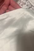 I wanted to use this dress for my courthouse wedding & photos, but this dress was delivered today, and when I opened it, I noticed a stain on the front area. I wish they had more of these dresses, as this was one of the last 2 they had, so that I could return and get another one that is brand new. - Tawnee H.