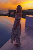I love the cut outs on this dress. I get so many compliments. It's very feminine and perfect for the summer. You can wear it to a festival or wine tasting. It's a great vacation dress. True to size and I love the flow and the pattern! - Chloe C.
