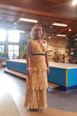 Love this dress to the max. Got so many compliments about how pretty this dress is. Wore it to the Gala; it matches the summer garden theme. Since I'm short, I had to alter it at the bottom. I ordered XS, but the waist is super tight; I was almost not able to zip it. The bust side is kinda puffy, and I altered it to make it not too big. Most of all, it's perfect. - Elisabeth M.