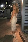 I wore this to a dressy restaurant for my dad's birthday. I received so many compliments on it. It fit me perfectly. Everything is long on me since I'm so short but this dress' long length on me looked good. Matched it with my nude heels from here too :) - Melissa B.