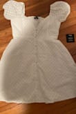it doesn't have a lot of shape in the waist, and the sleeves are a little itchy, but it's still a cute summery dress - Cora C.