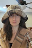 I was so excited for this hat, but it runs huge! It looks so ridiculous on me, so I had to return it, unfortunately. - Rachel D.
